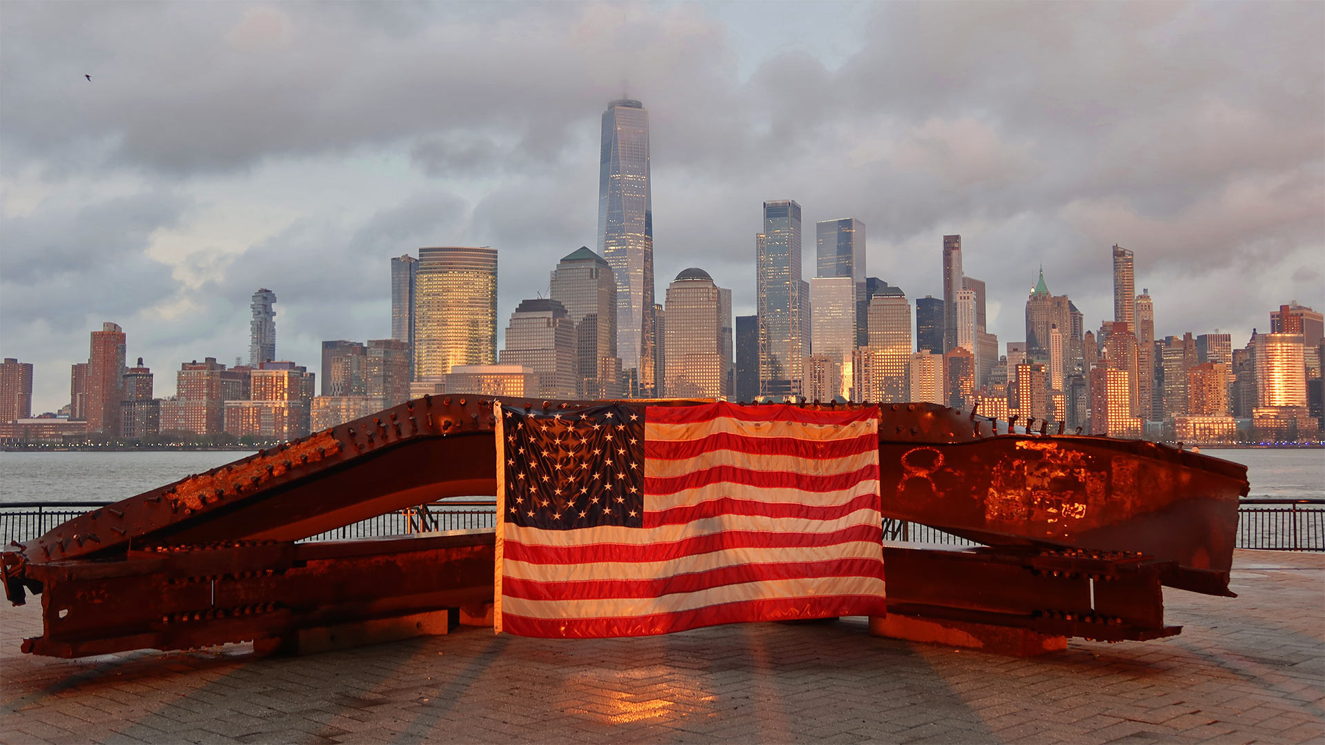 US flag on part of a 9/11 memorial overlooking the New York skyline from Exchange Place, Jersey City, New Jersey - Gary Hershorn/Getty Images)