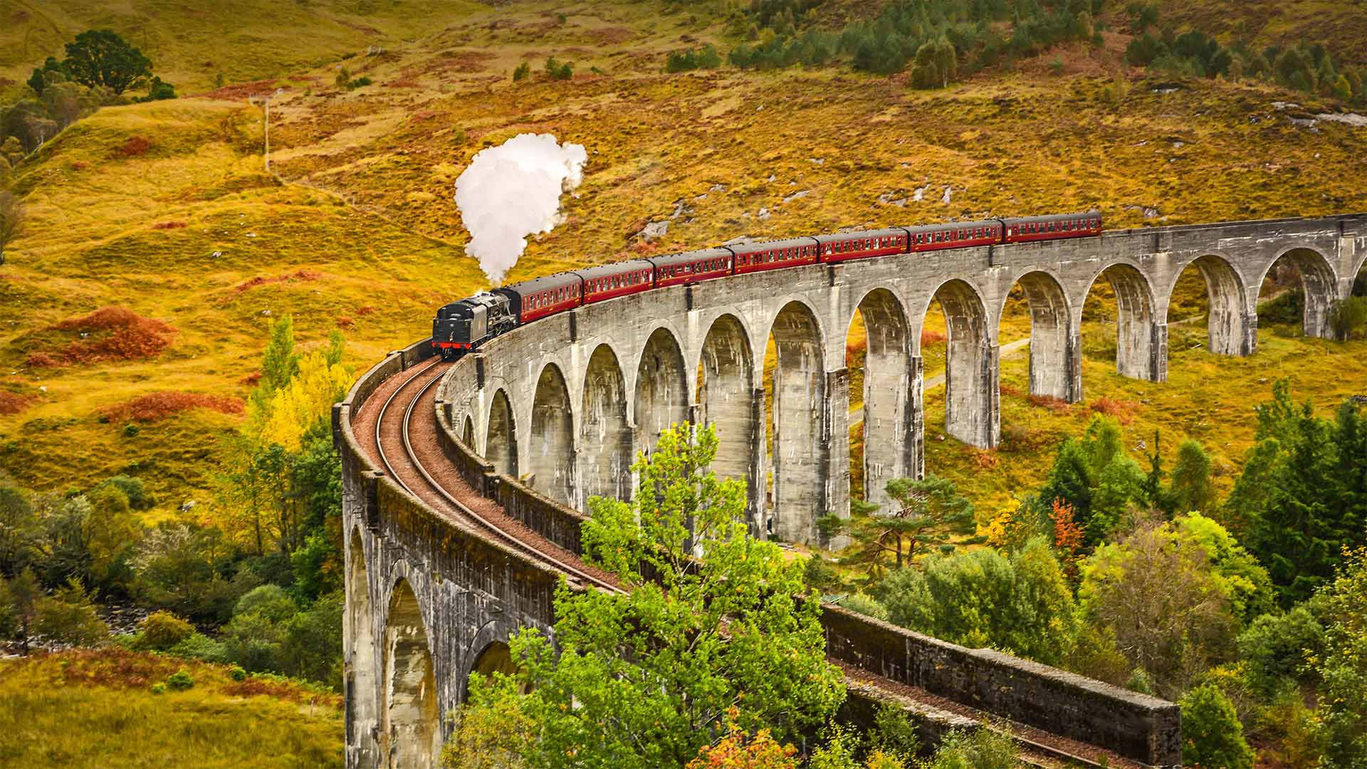 The Jacobite steam train crossing the Glenfinnan Viaduct in Inverness-shire, Scotland - The Escape of Malee/Shutterstock)