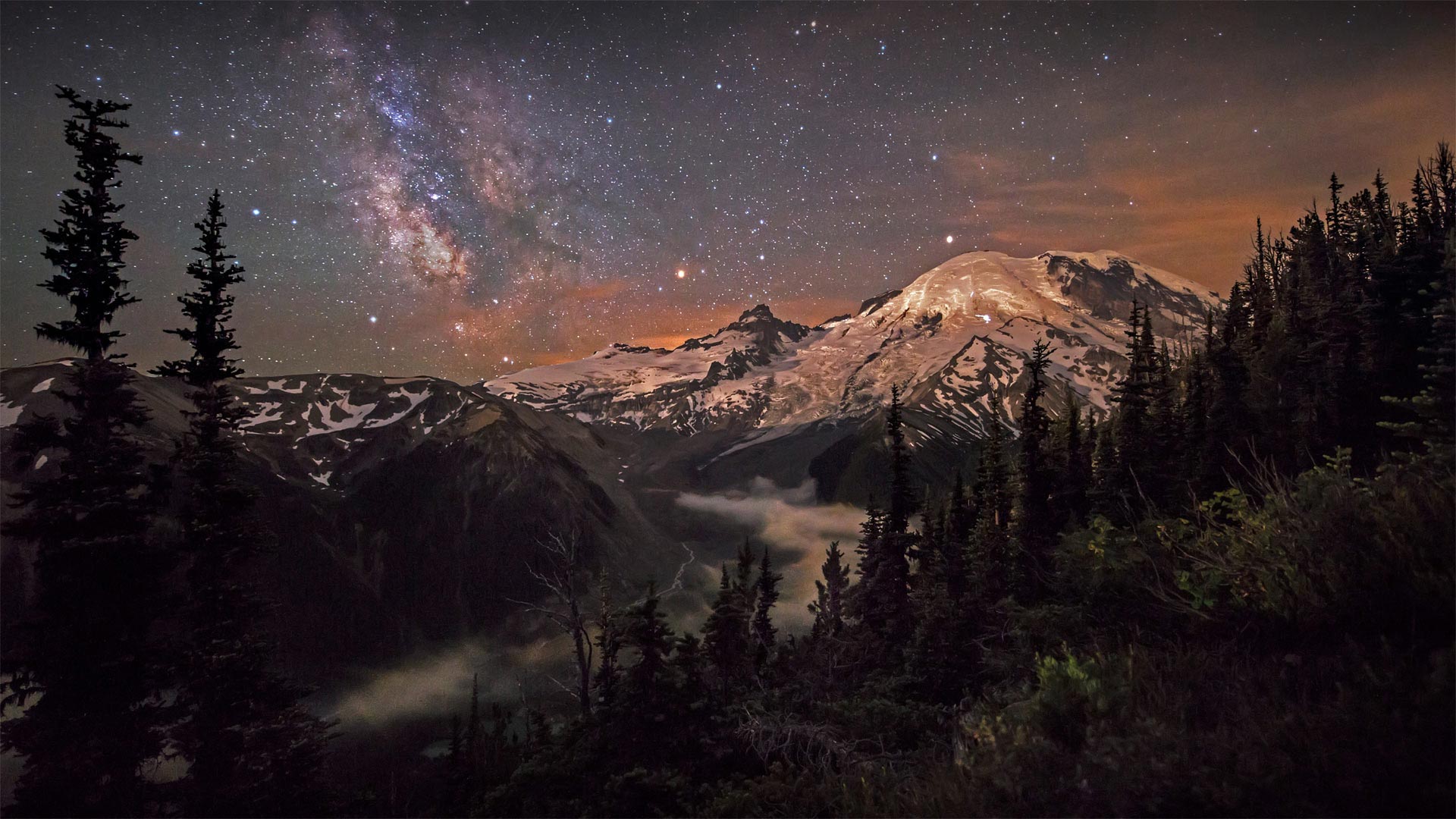 Moonlight and the Milky Way over Mount Rainier in Mount Rainier National Park, Washington - Brad Goldpaint/Cavan)