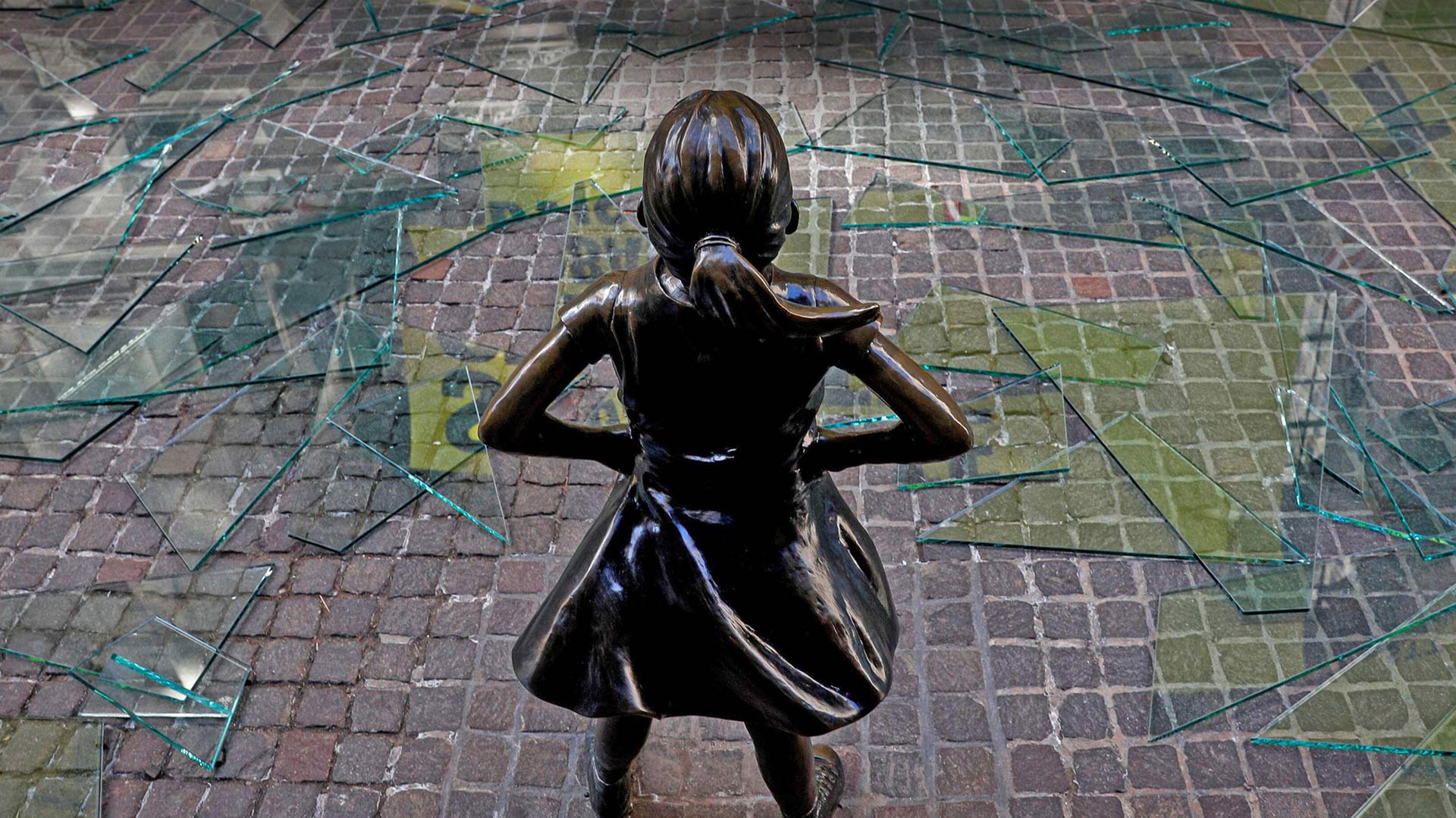 The 'Fearless Girl' statue outside the New York Stock Exchange in New York City - Brendan McDermid/Alamy)