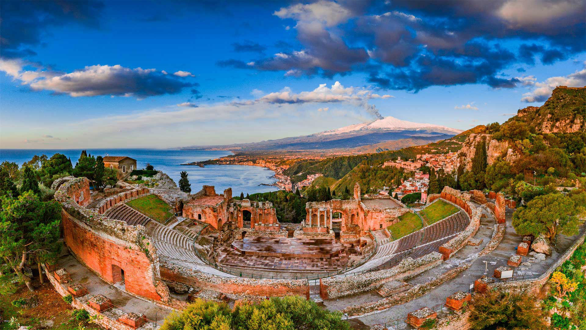 Ancient theater of Taormina in Sicily, Italy - Antonino Bartuccio/eStock Photo)