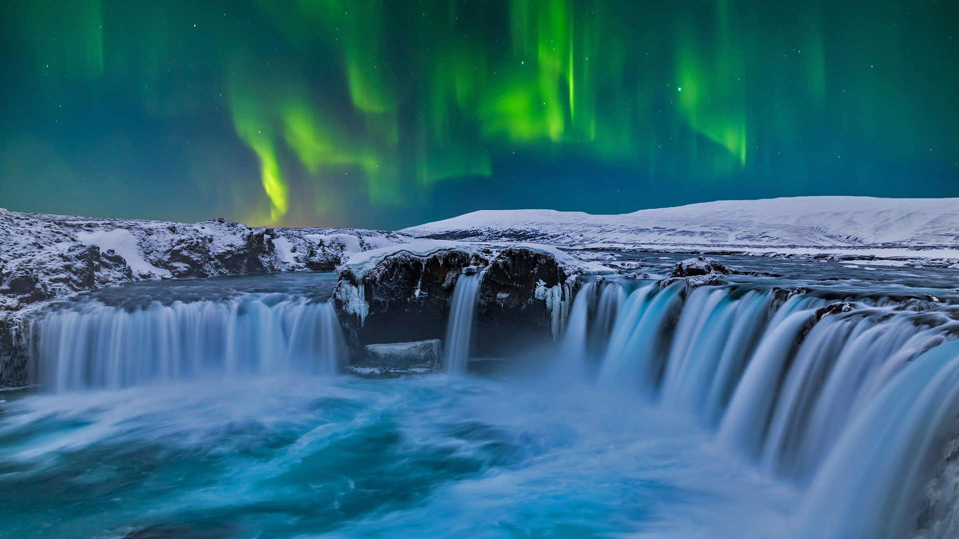 Goðafoss waterfall under the northern lights, Iceland - Anton Petrus/Getty Images)