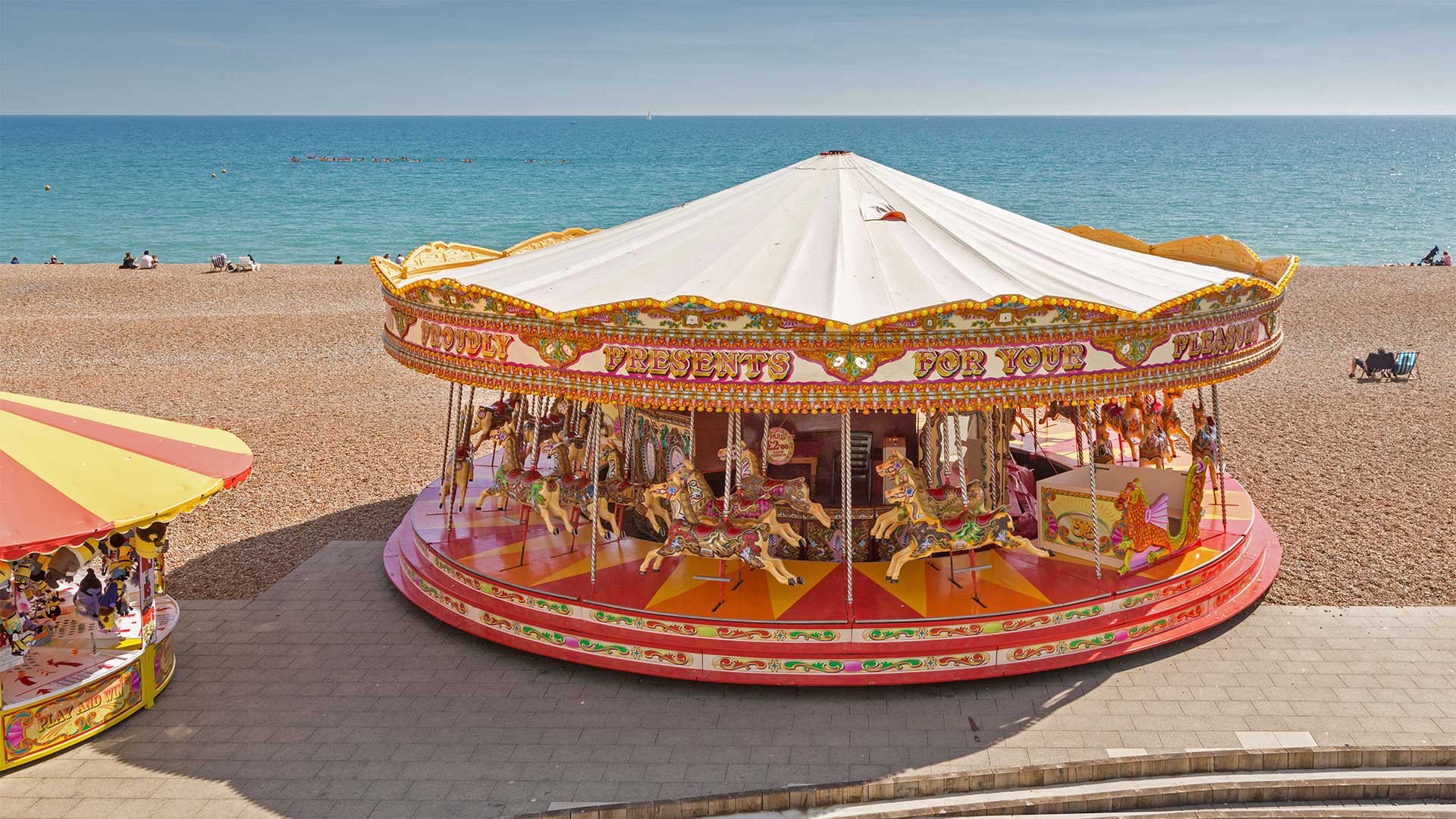 Golden Gallopers Carousel on the seafront in Brighton, East Sussex, England - Graham Prentice/Alamy)