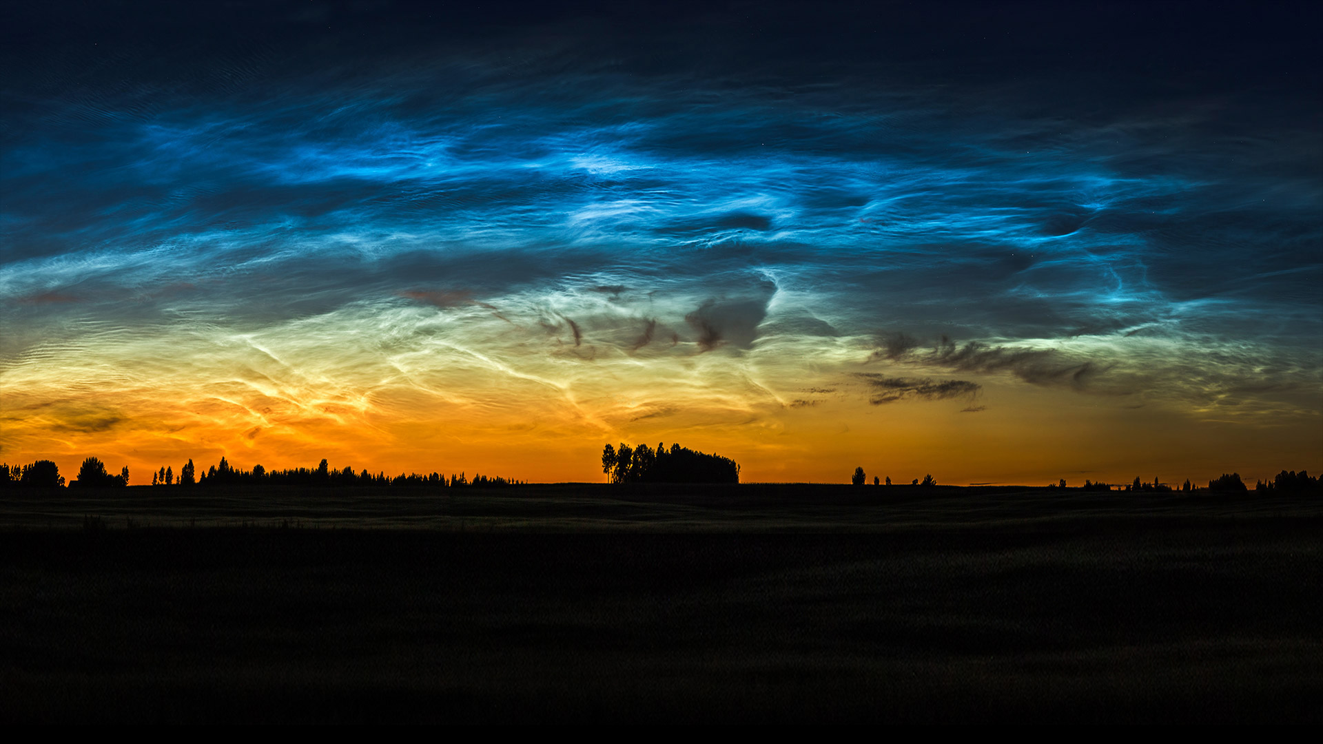 Noctilucent clouds in Lithuania - ljphoto7/Getty Images)