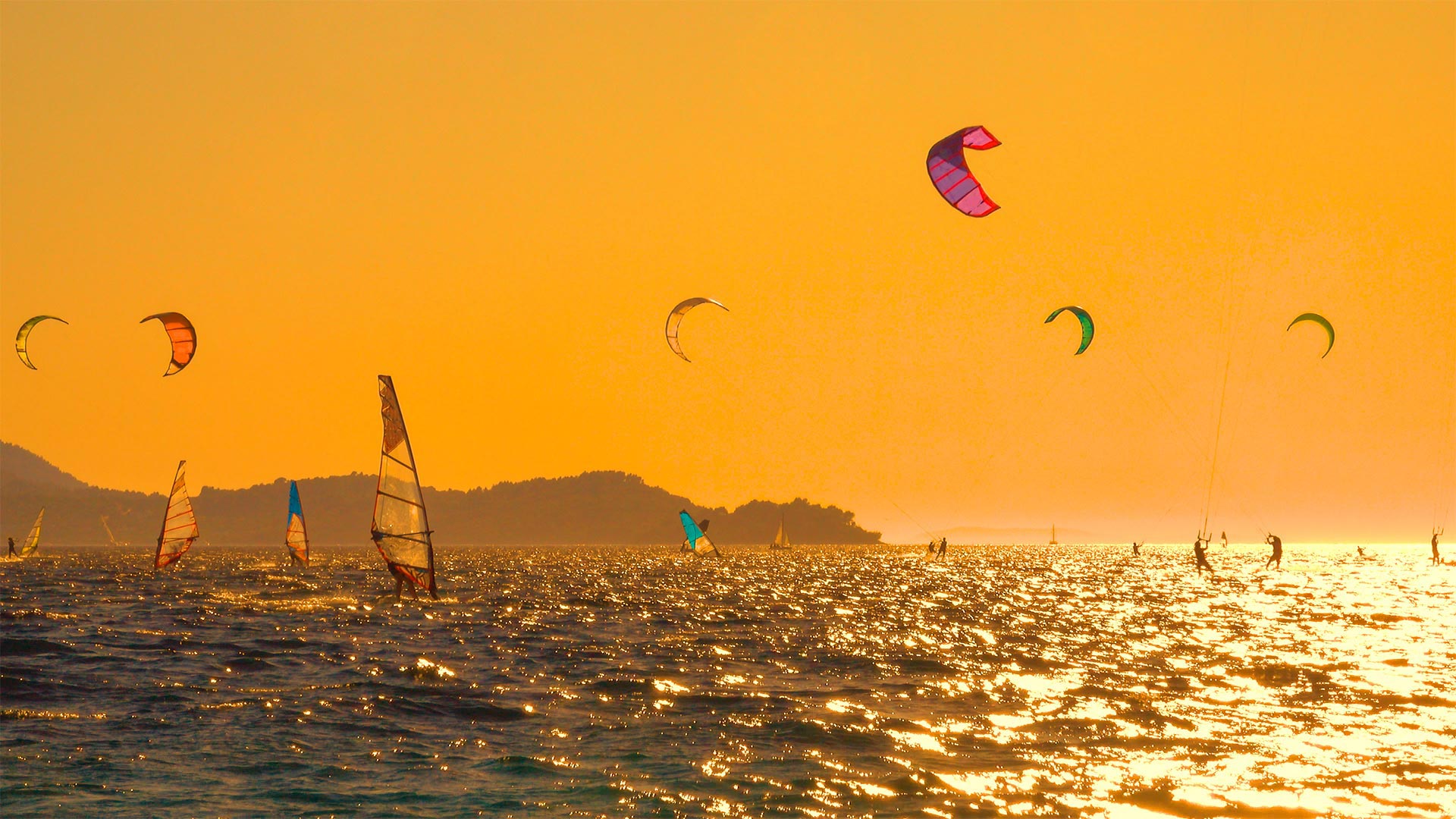 Kiteboarders and windsurfers off the Pelješac Peninsula, Croatia - helivideo/Getty Images)