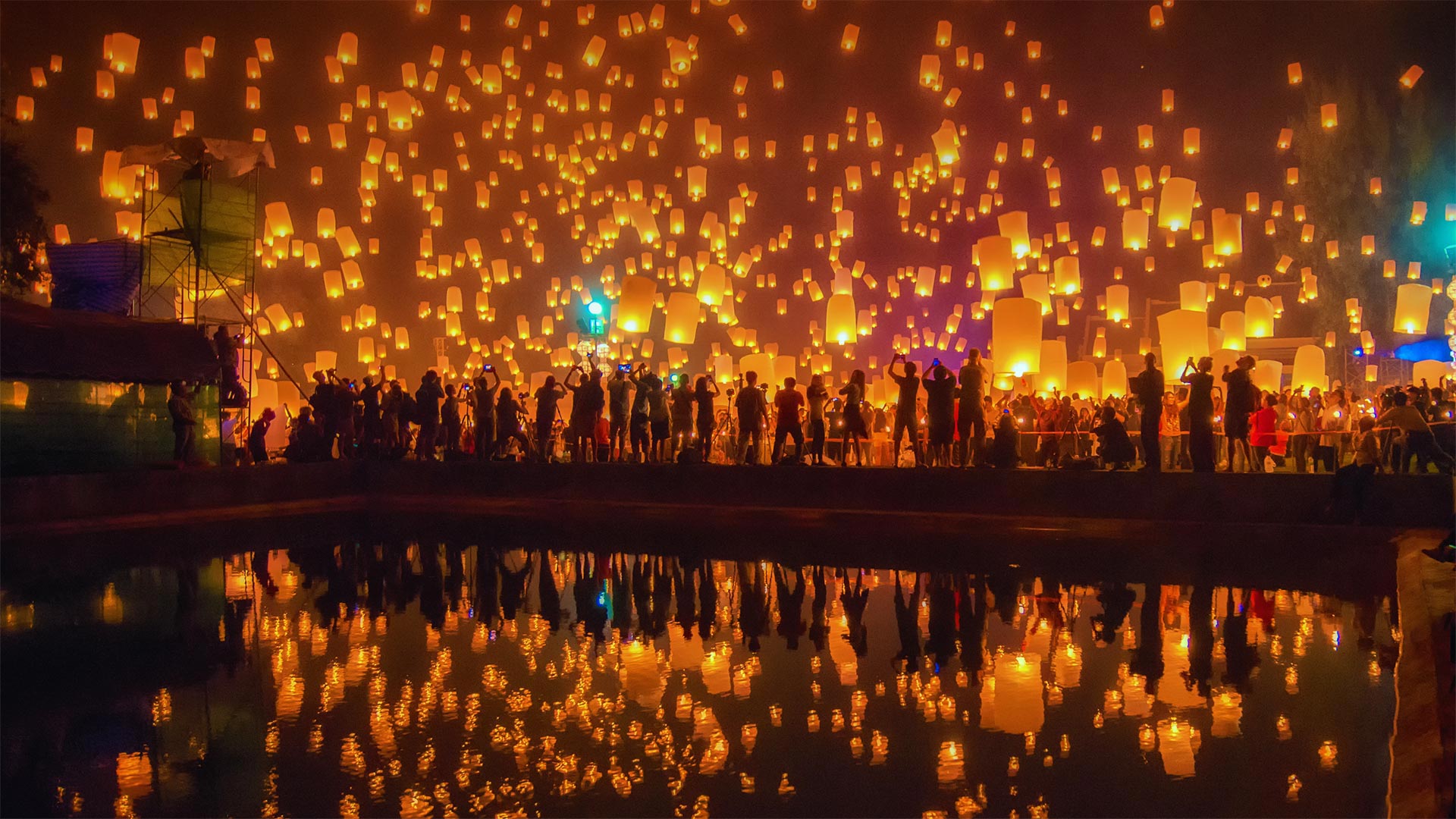 Sky lanterns take flight during the Yi Peng Festival in Chiang Mai, Thailand - Suttipong Sutiratanachai/Getty Images)