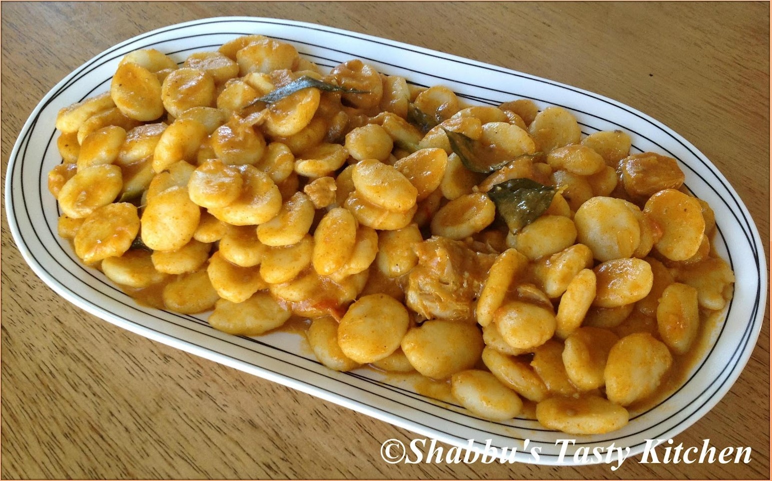 kozhi-kadumbu-steamed-rice-dumplings-in