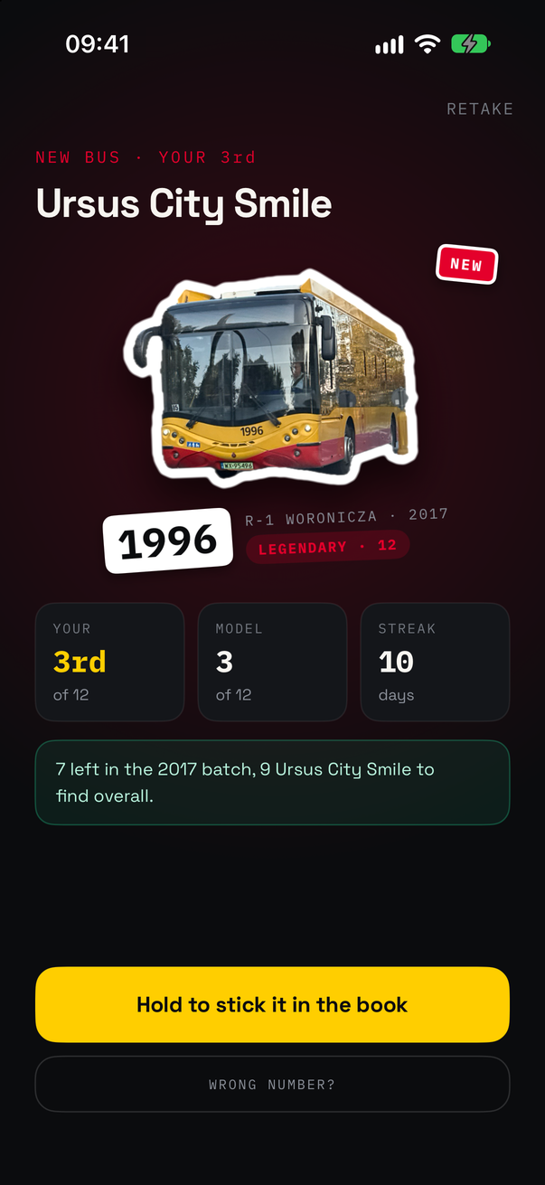 The reveal after catching Ursus City Smile #1996: NEW BUS · YOUR 3rd, the bus cut out of its photo as a die-cut sticker with a thick white border, a 1996 number tag, R-1 WORONICZA · 2017, LEGENDARY · 12, and the line: 7 left in the 2017 batch, 9 Ursus City Smile to find overall. Below it, Hold to stick it in the book.