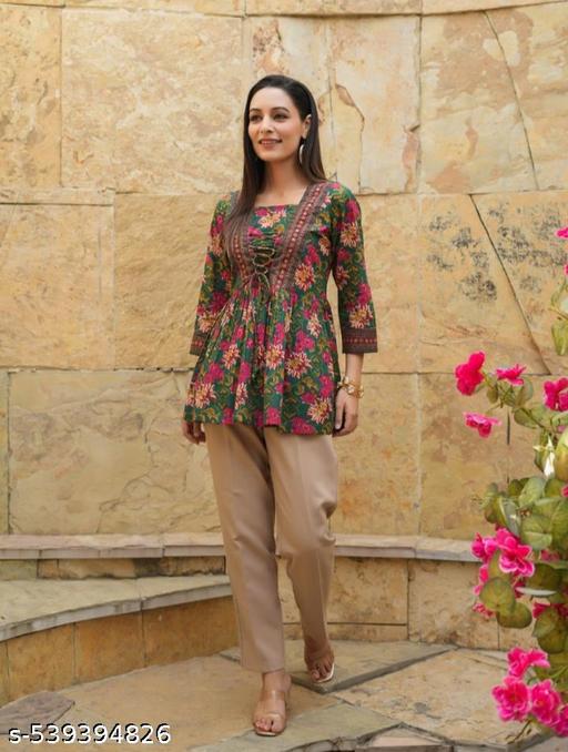 BEST STYLISH PRINTED IMPIRE TUNIC TOP AND SHORT KURTIS FOR WOMEN AND GIRLS summer wear casual wear style top  - Arvia