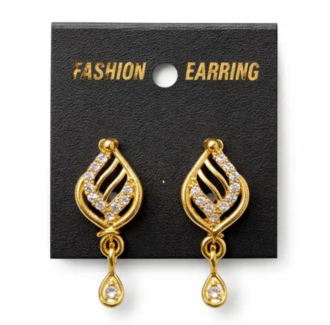 A graceful teardrop or leaf-like pattern with intricate cut-outs and a small hanging drop at the bottom. ( Micro E-12 ) - Diobistore