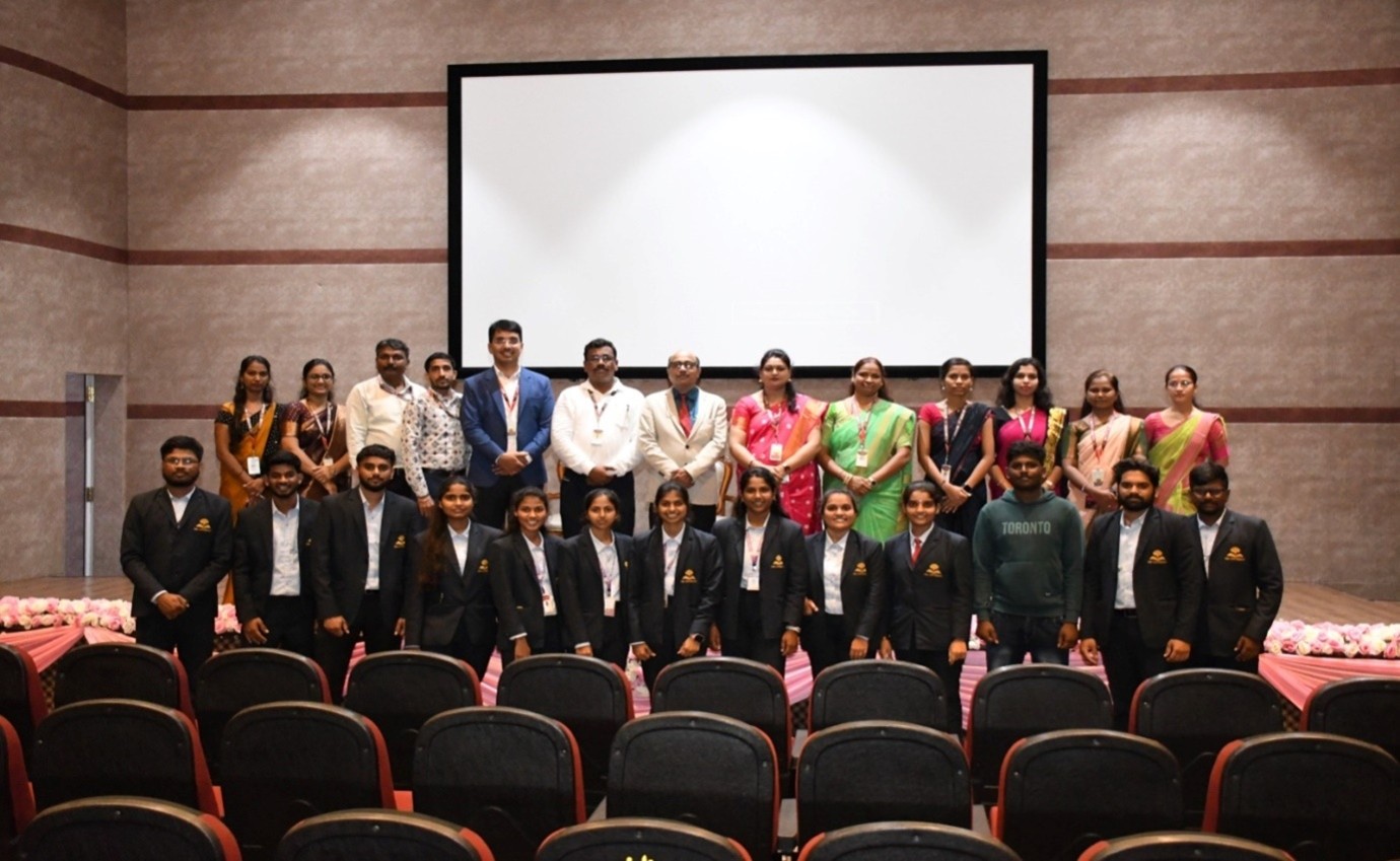 Faculty with M.Com students