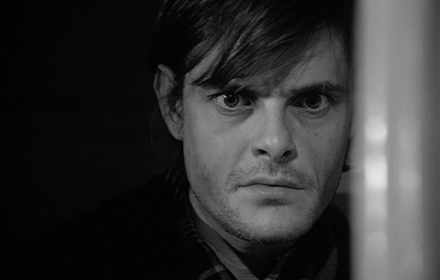 János, hiding in the hospital corner, his eyes wide open, witnesses everything