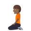 🧎🏾