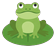 Green frog sitting on a lily pad