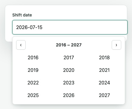Year view popover open, showing the paged 12-year drill-down grid