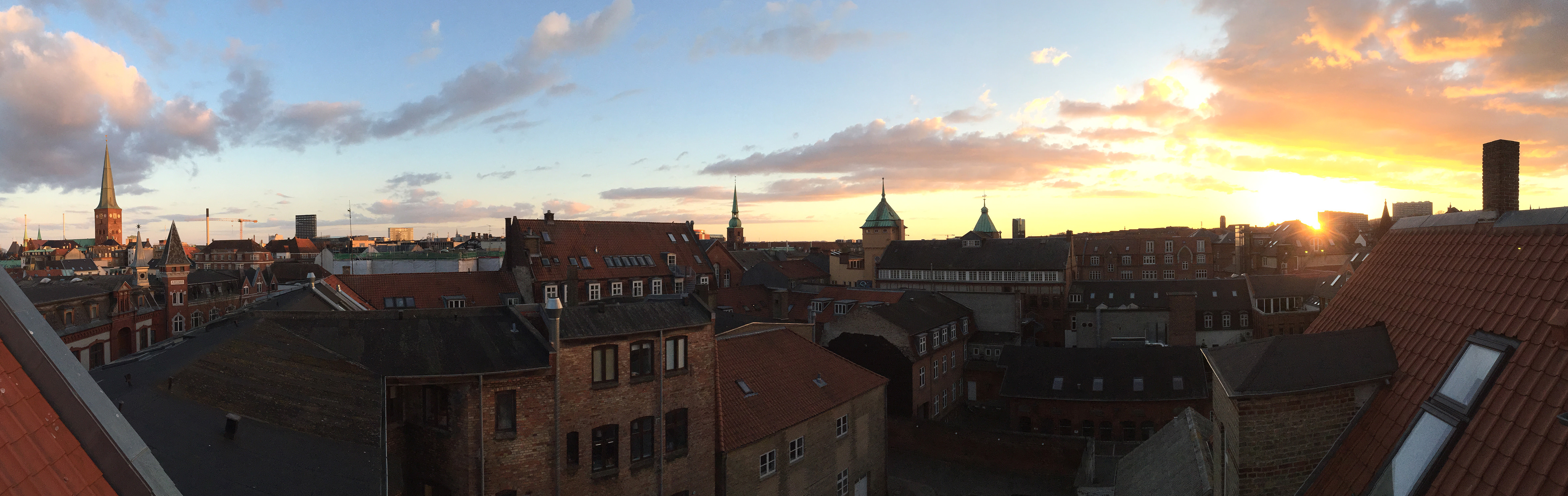 The Aarhusian Sunset A panorama taken from the roof of my penthouse unit in the heart of Aarhus.
