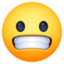 grimacing