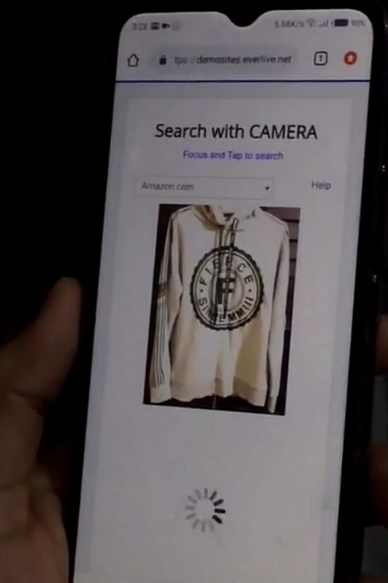 Shows that you focus an item with your mobile phone camera and searching it on your desired websites.
