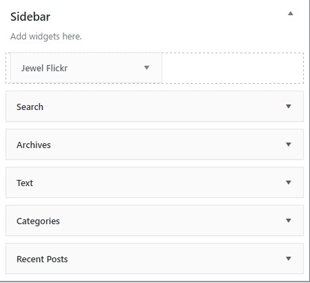 Drag and drop the Jewel Flickr widget in your sidebar.