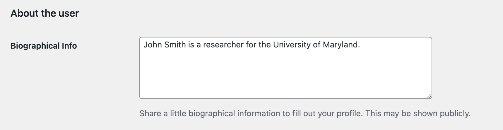 Scroll down the user's edit page until you see Multisite Author Bio.