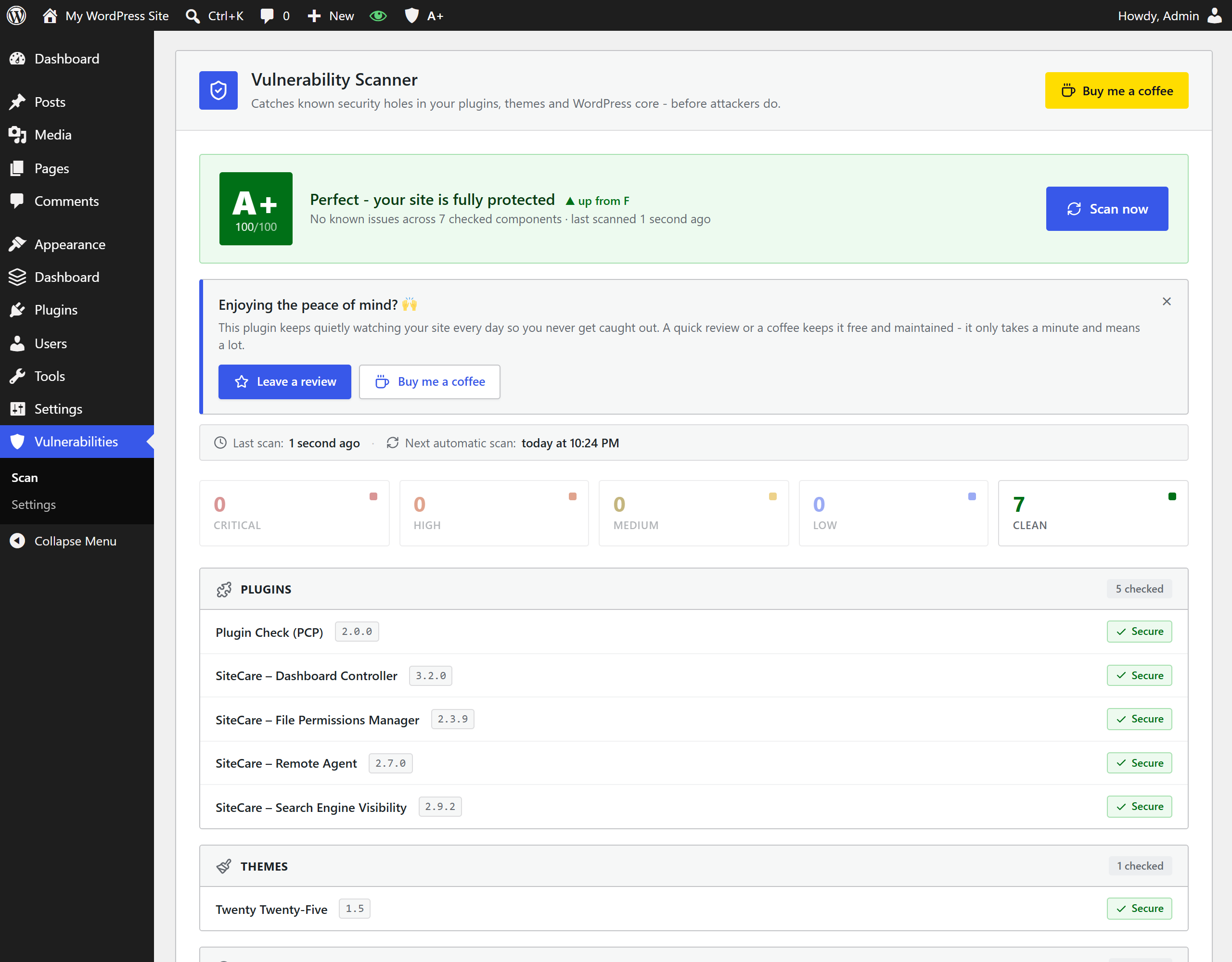 All clear - the A-F security score, severity tiles and every plugin, theme and WordPress core checked.