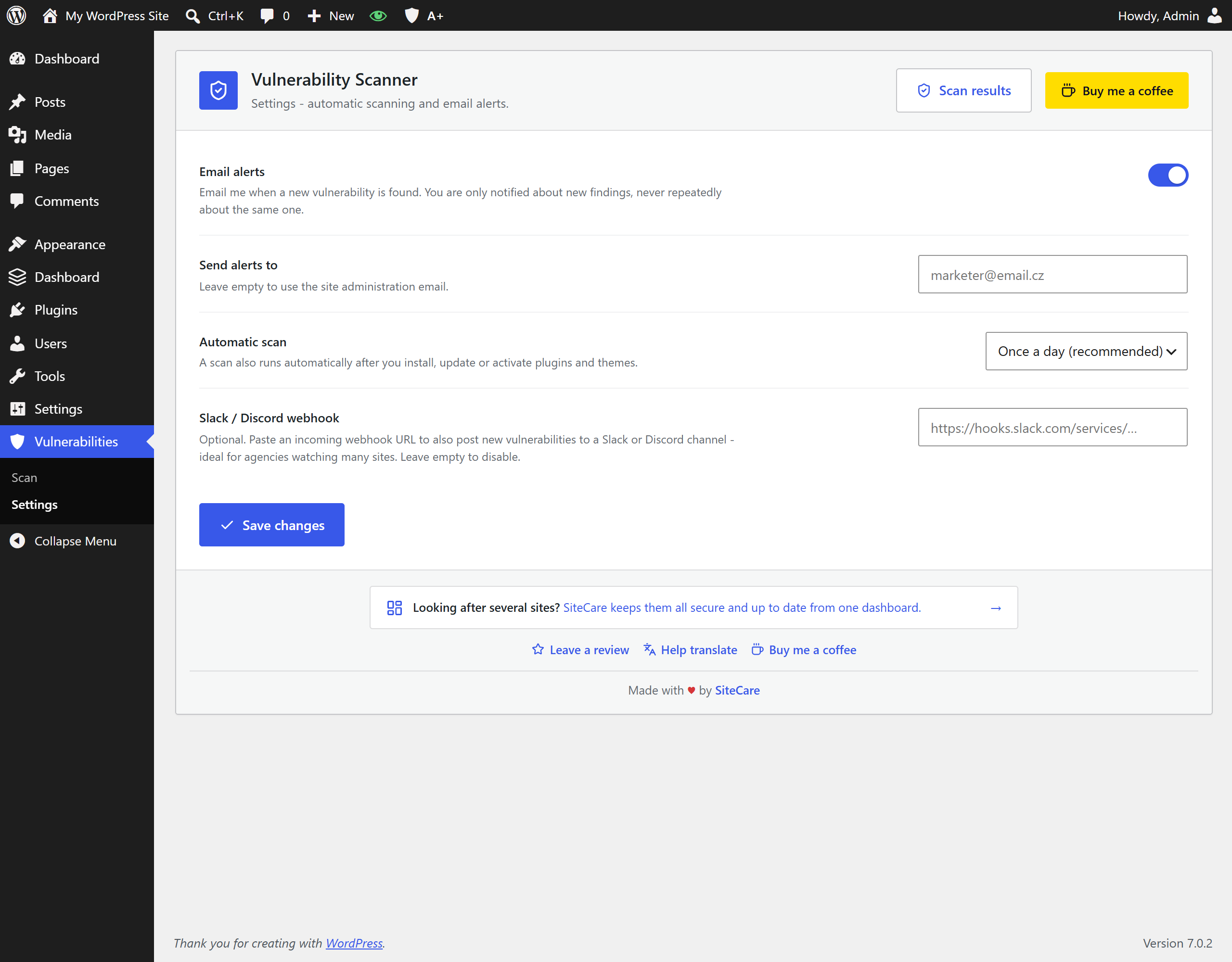 Settings: automatic scan frequency, email alerts and an optional Slack/Discord webhook.