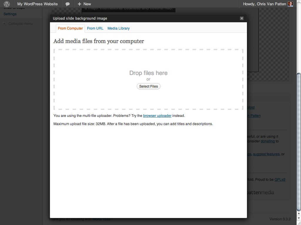 Use the standard WordPress uploader to set your background image.